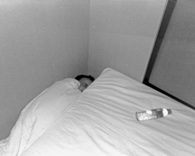 down by bed black and white